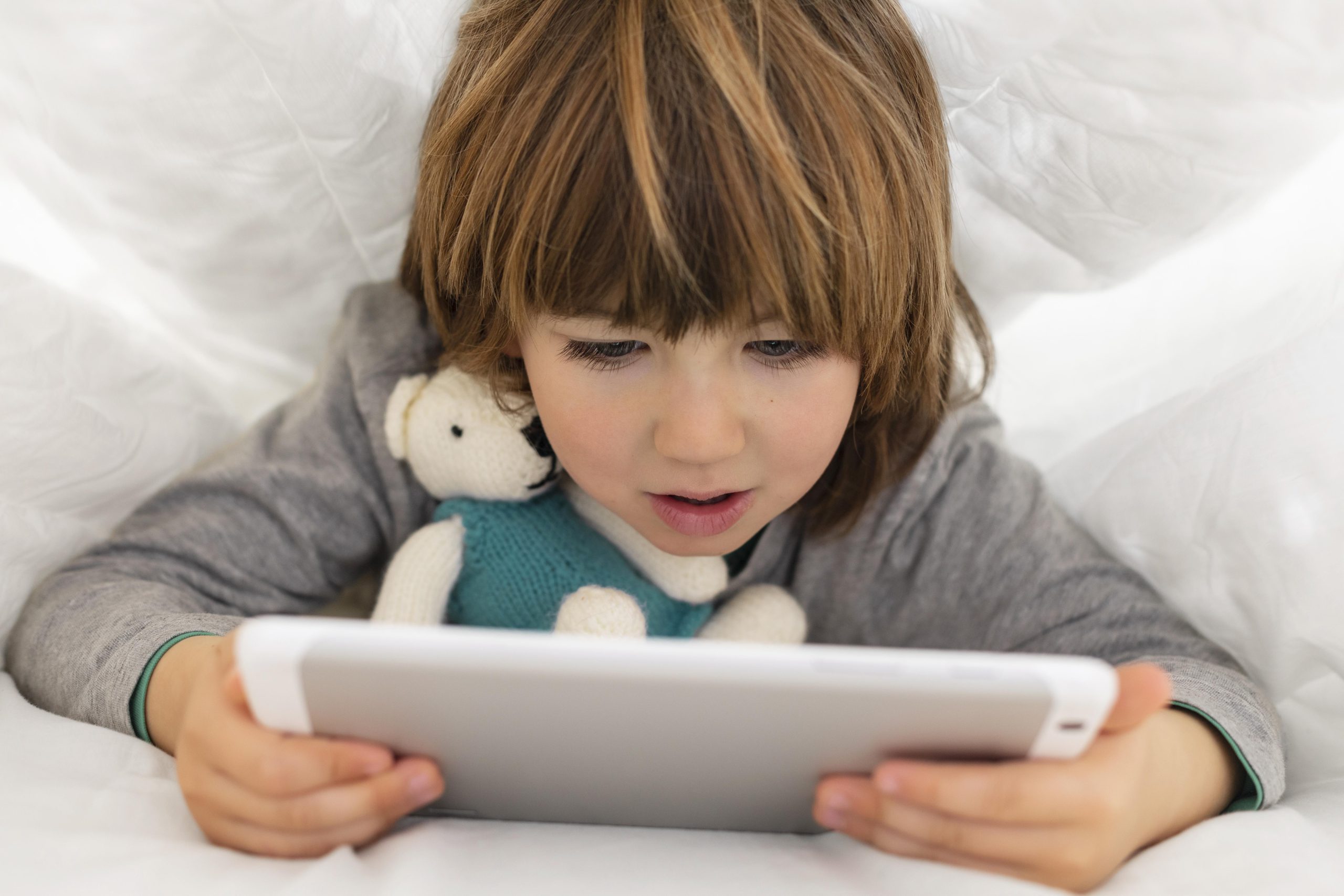 little-boy-using-tablet little-boy-using-tablet
